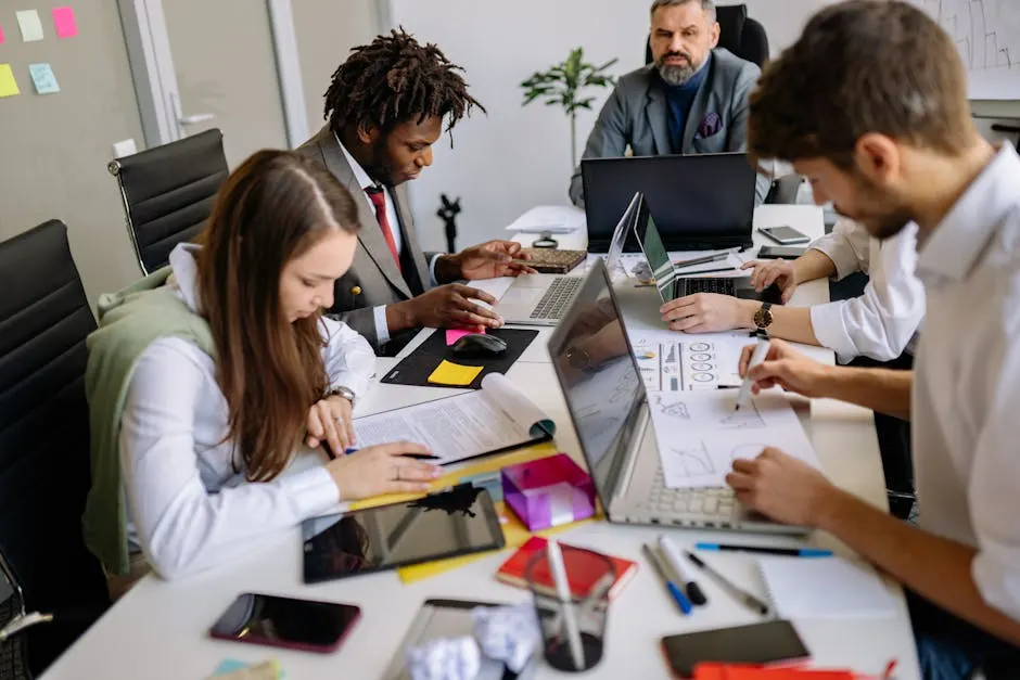 Creative team reviewing campaign mockups together
